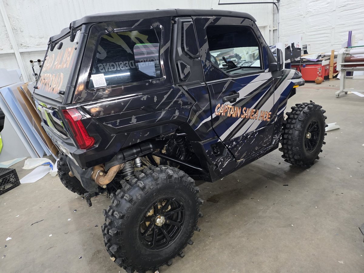 Captin Save A Hoe — Joshua's wrapped Polaris Xpedition, the Bad Alibi Offroad rescue buggy